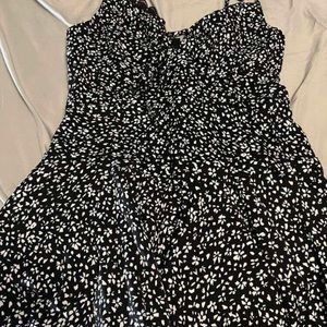 Black and white lace trimmed romper, size medium fits as a small/medium.